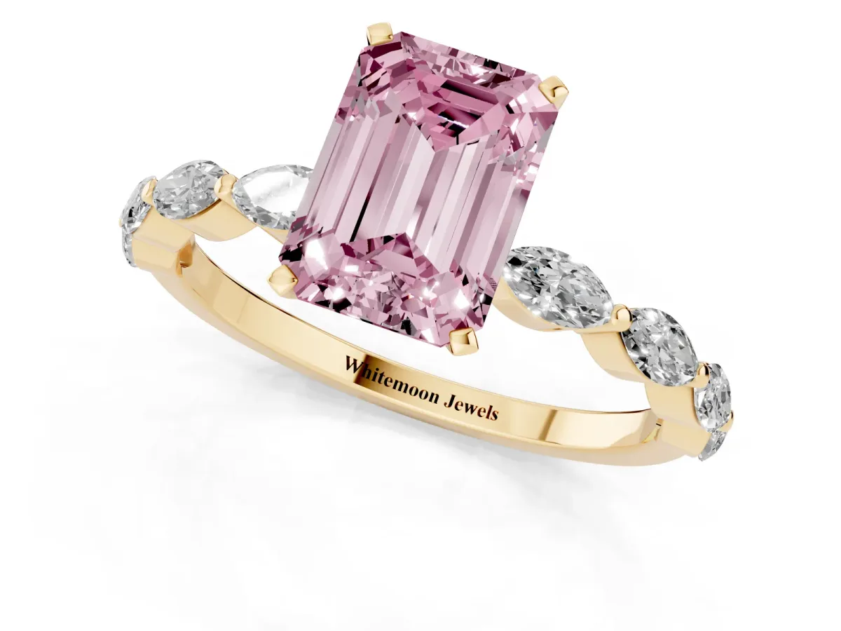 Fancy Pink Emerald Cut Diamond Ring with Marquise Side Stones and Prong Setting Yellow gold