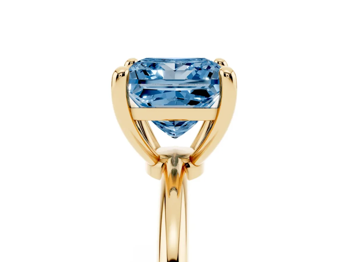 Fancy Blue Princess Cut Solitaire Diamond Ring with 4-Prong Setting on a Classic Band Yellow gold