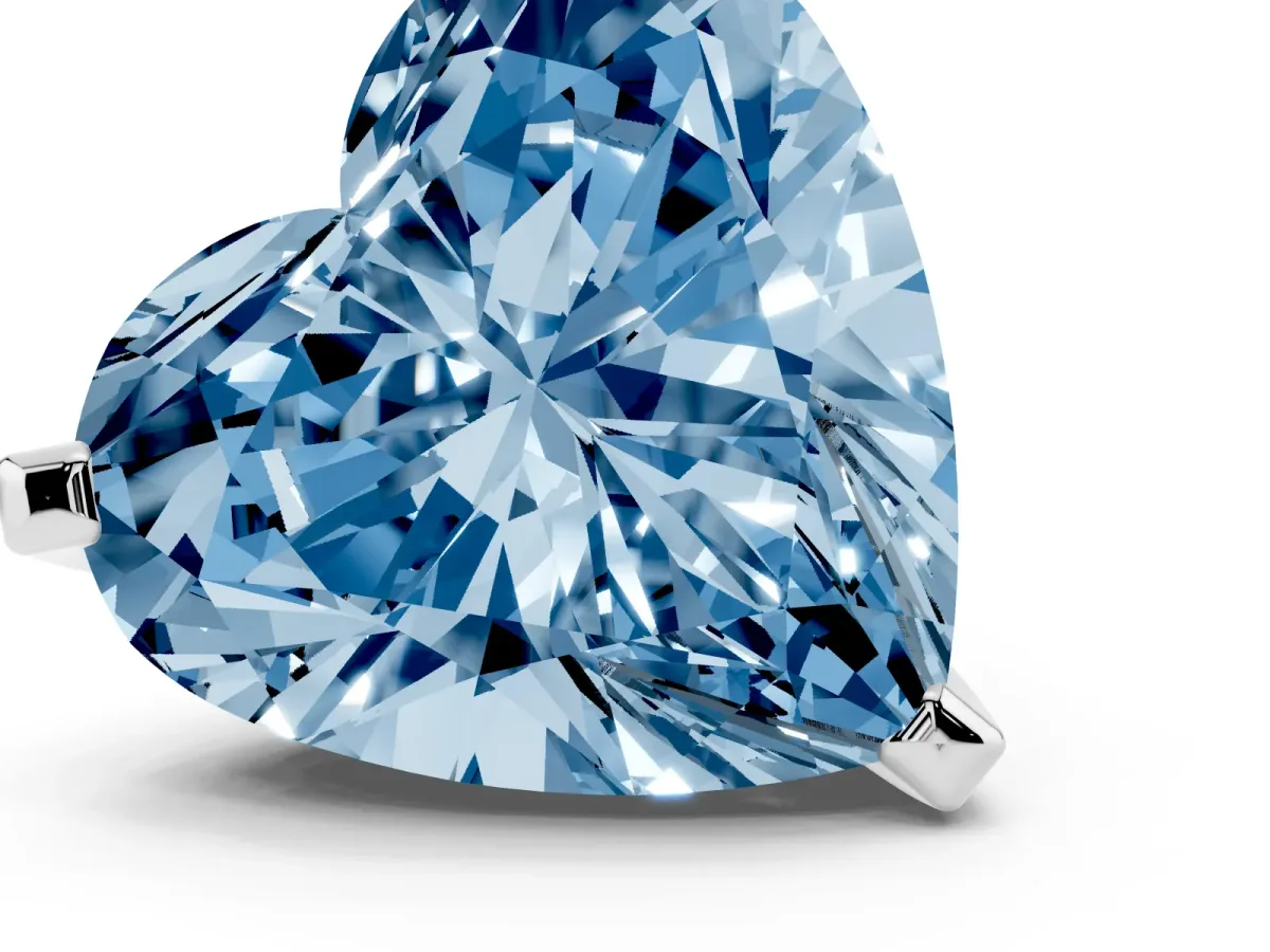 Fancy Blue Heart Cut Diamond Solitaire Ring with Prong Setting and Classic Band Platinum