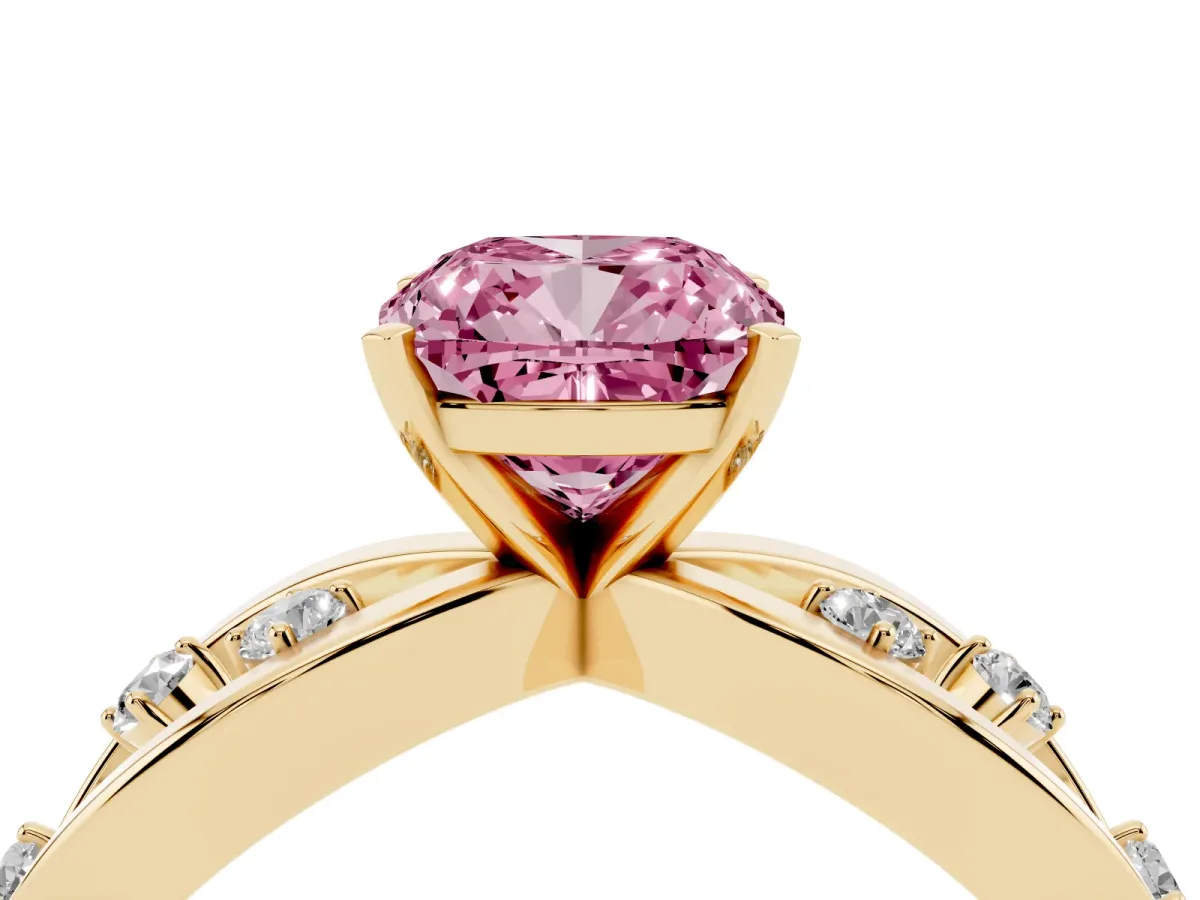 Fancy Pink Cushion Cut Cut Solitaire Diamond with Side Stones on Criss-Cross Band and Four-Prong Setting Yellow gold