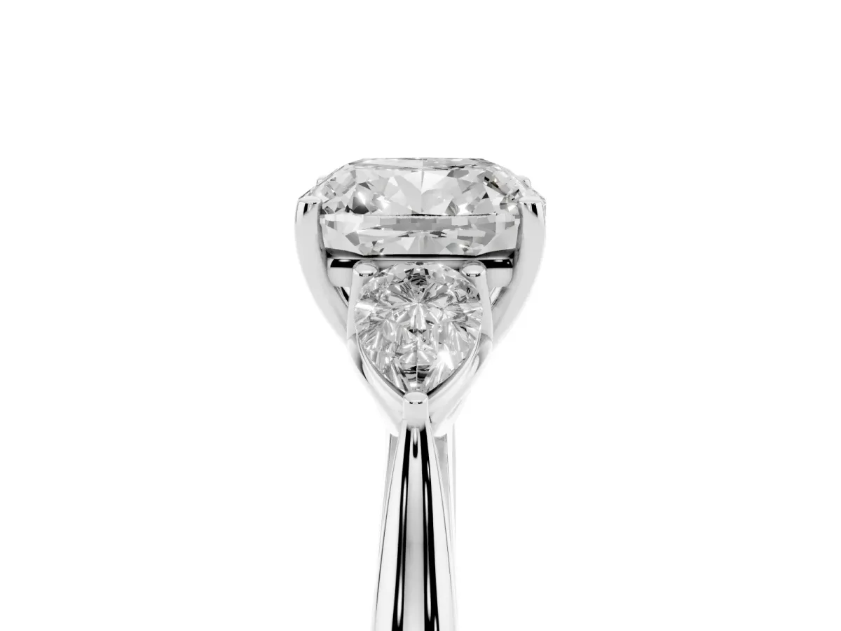 Cushion Cut Diamond Three-Stone Ring with Pear Side Stones and Prong Setting Platinum