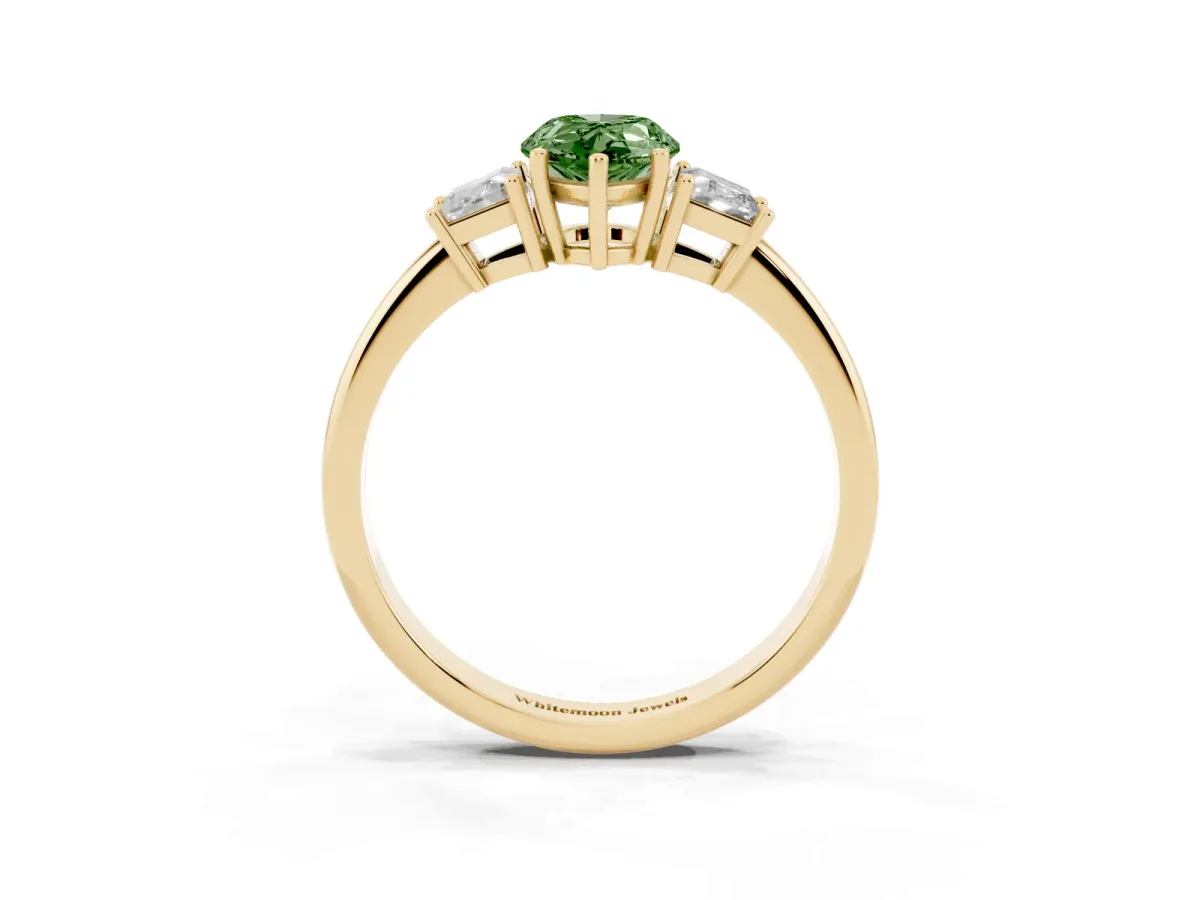 Fancy Green Pear Cut Diamond Three-Stone Ring with Trapezoid Side Stones and Prong Setting Yellow gold