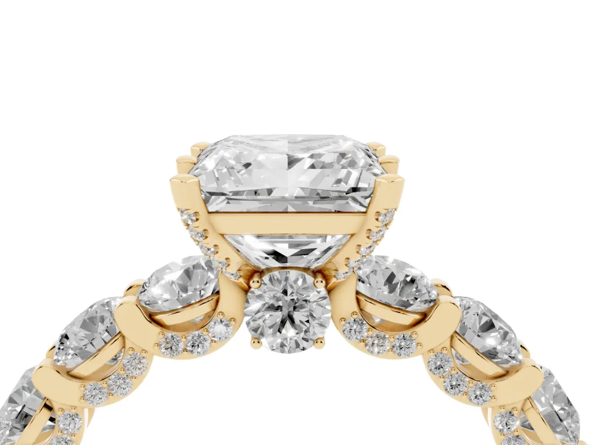 Princess Cut Diamond Side Stone Engagement Ring with Four-Prong Setting Yellow gold
