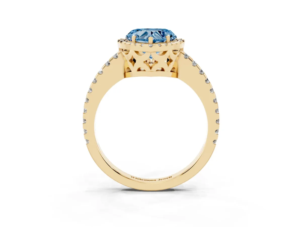 Fancy Blue Heart Cut Diamond Halo Engagement Ring with Pavé Band and Prong Setting Yellow gold