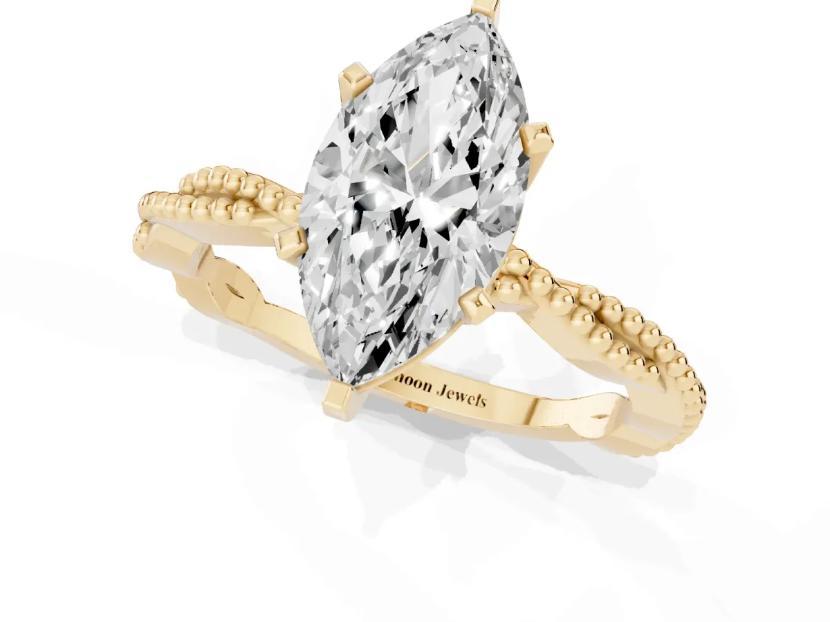 Marquise Cut Solitaire Twisted Band with Bead Prong Setting Yellow gold