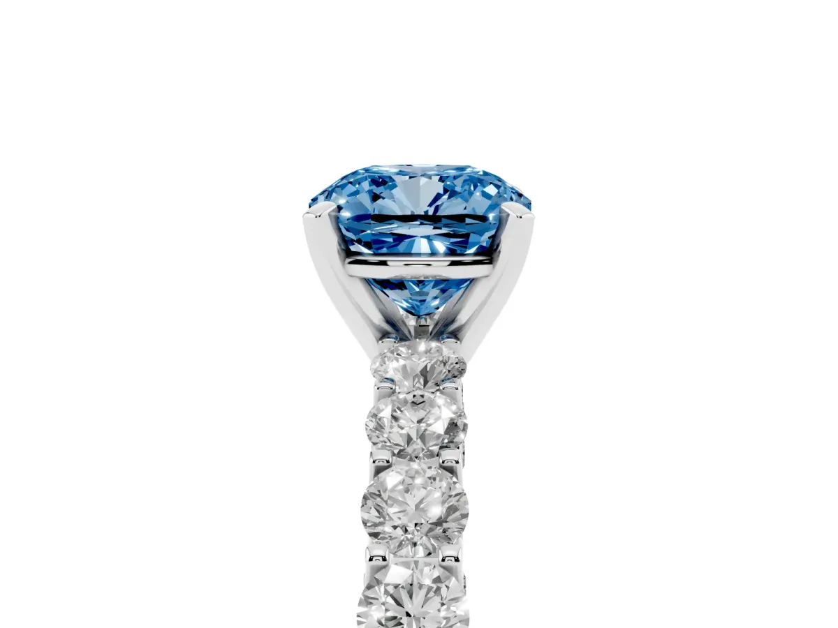 Fancy Blue Cushion Cut Diamond Solitaire Ring with Shared Prong Pavé Band and Four-Prong Setting Silver