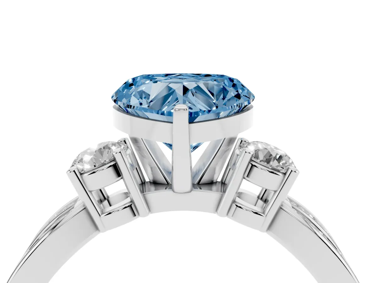 Fancy Blue Three-Stone Heart Cut Cut Diamond Twist Band with Prong Setting Silver