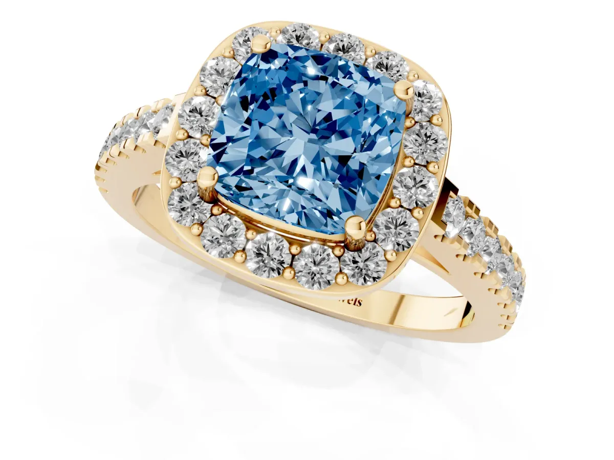 Fancy Blue Cushion Cut Diamond Halo Ring with Round Pavé Split Shank and Prong Setting Yellow gold