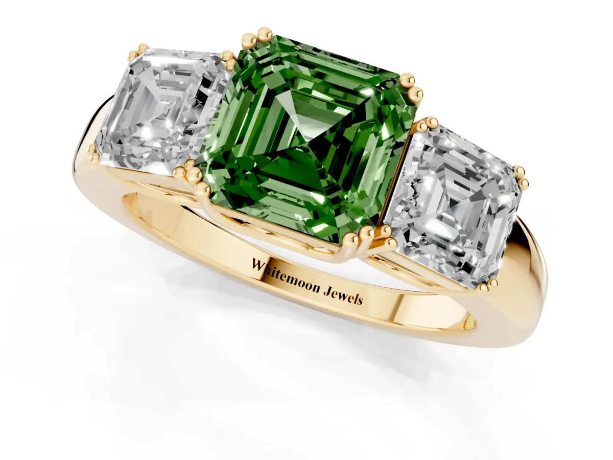 Fancy Green Three-Stone Asscher Cut Cut Diamond Ring with Channel Set Band and Four-Prong Setting Yellow gold