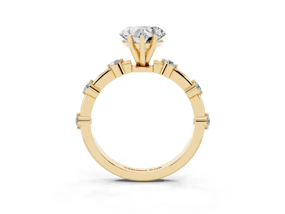 Heart Cut Solitaire Diamond Ring with Bezel Set Side Stones and Prong Setting Yellow gold