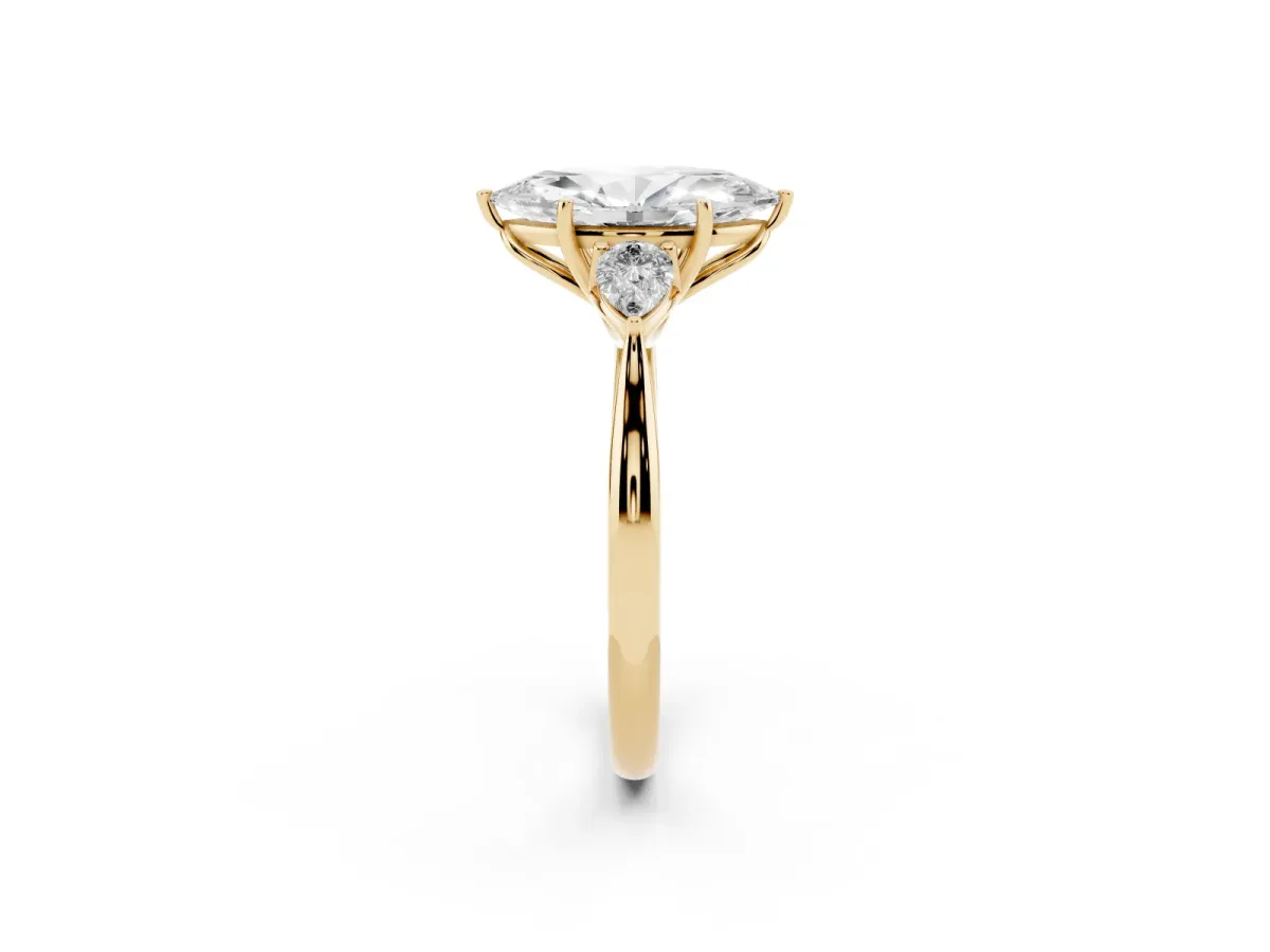 Three-Stone Marquise Cut Brilliant Diamond Solitaire Ring with Tapered Band and Four-Prong Setting Yellow gold