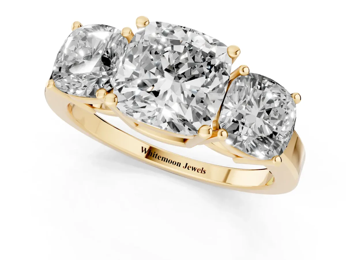 Three-Stone Cushion Cut Cut Diamond Engagement Ring with Flat Band and Four-Prong Setting Yellow gold