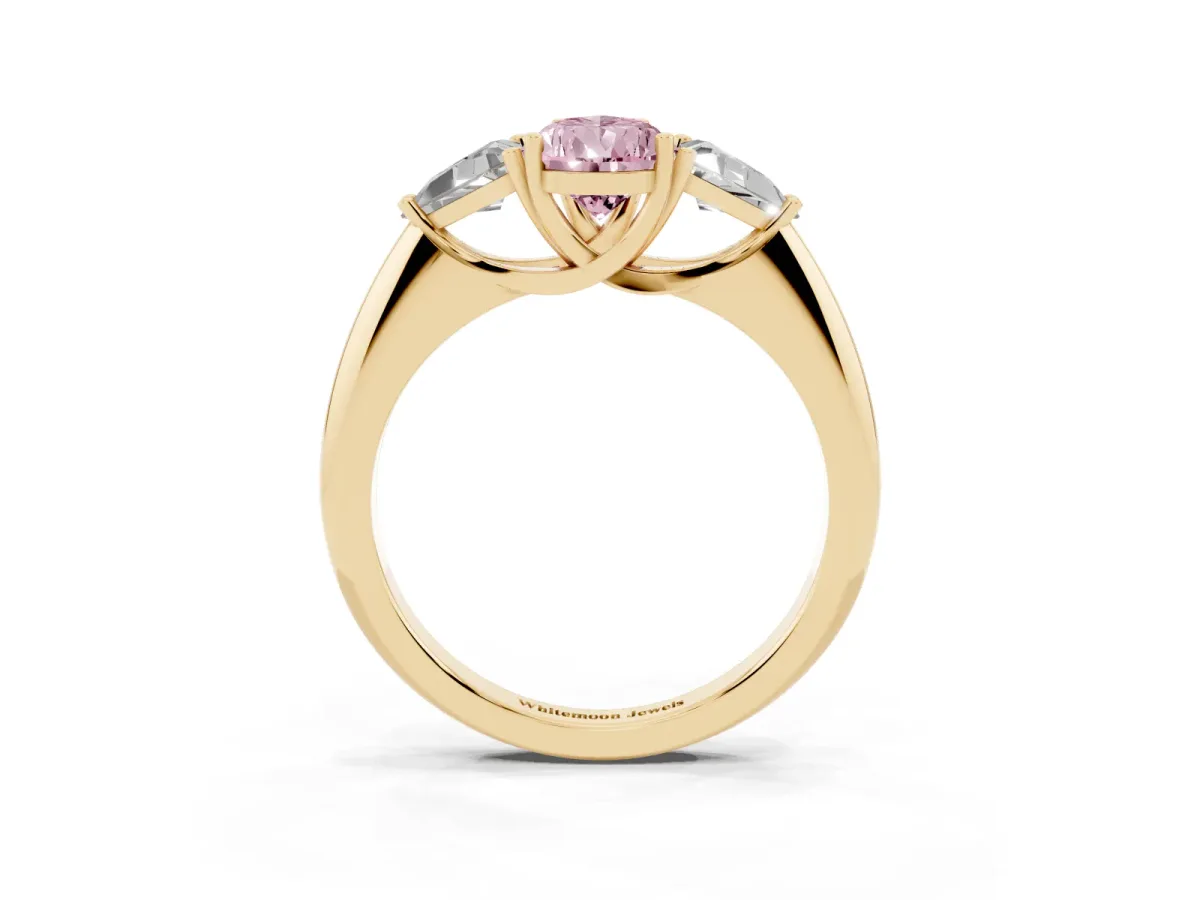 Fancy Pink Three-Stone Pear Cut Diamond Engagement Ring with Trillion Side Stones and Prong Setting Yellow gold