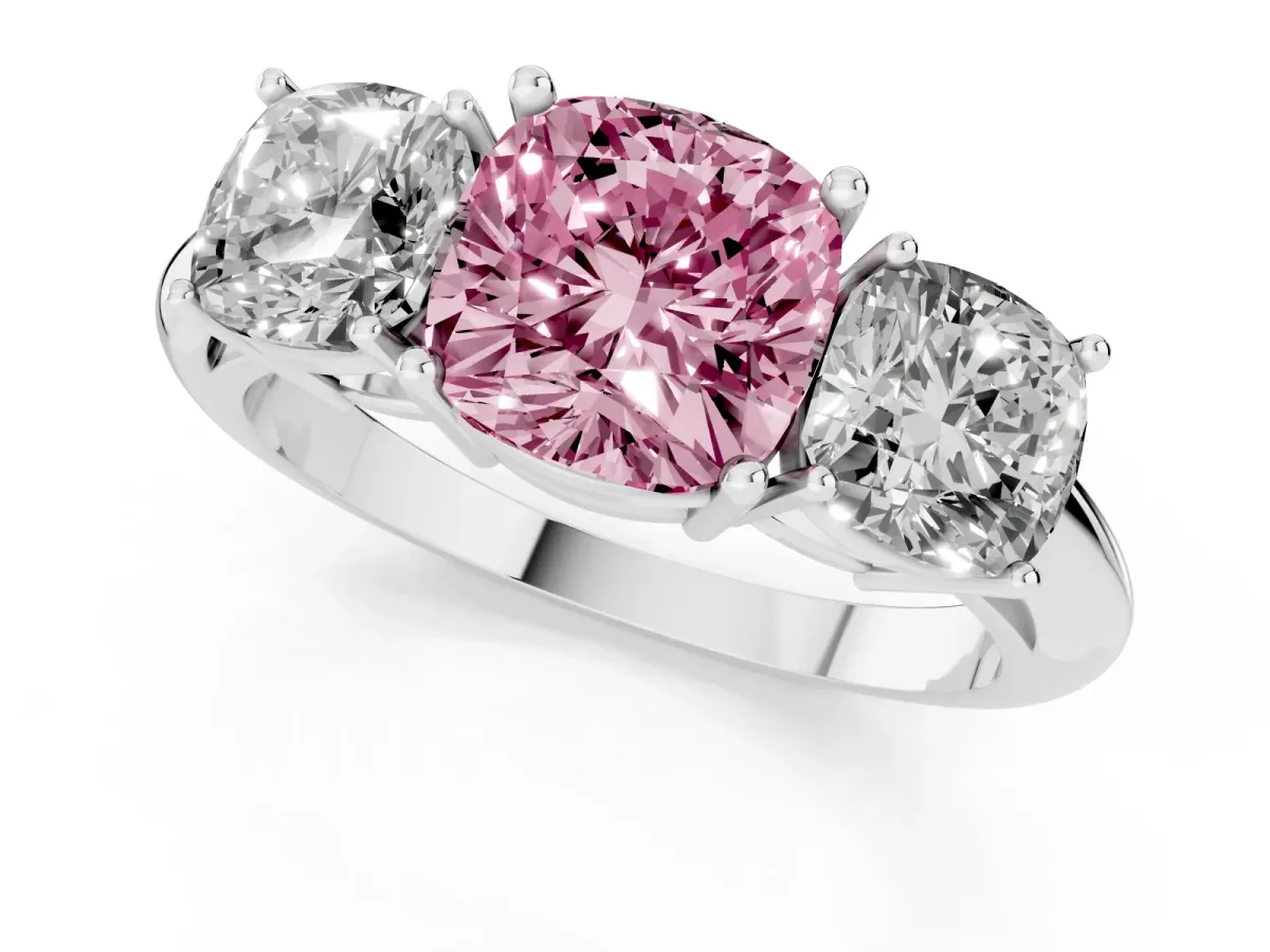 Fancy Pink Three-Stone Cushion Cut Cut Diamond Engagement Ring with Prong Setting on a White Gold Band Platinum
