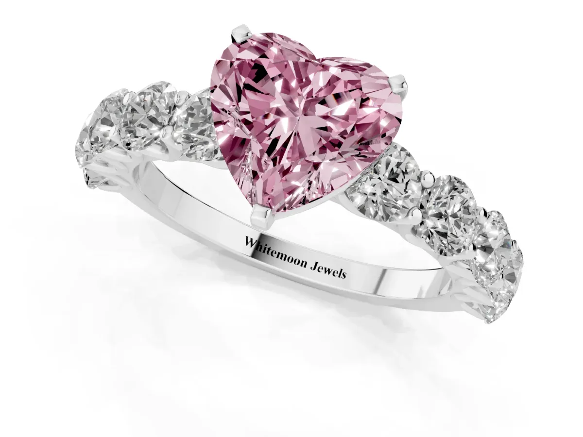 Fancy Pink Heart Cut Diamond Prong Setting with Side Stones on a Pave Band Silver