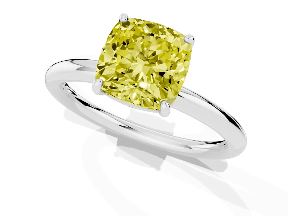 Fancy Yellow Cushion Cut Solitaire Diamond Ring with Four-Prong Setting on a Plain Band Silver