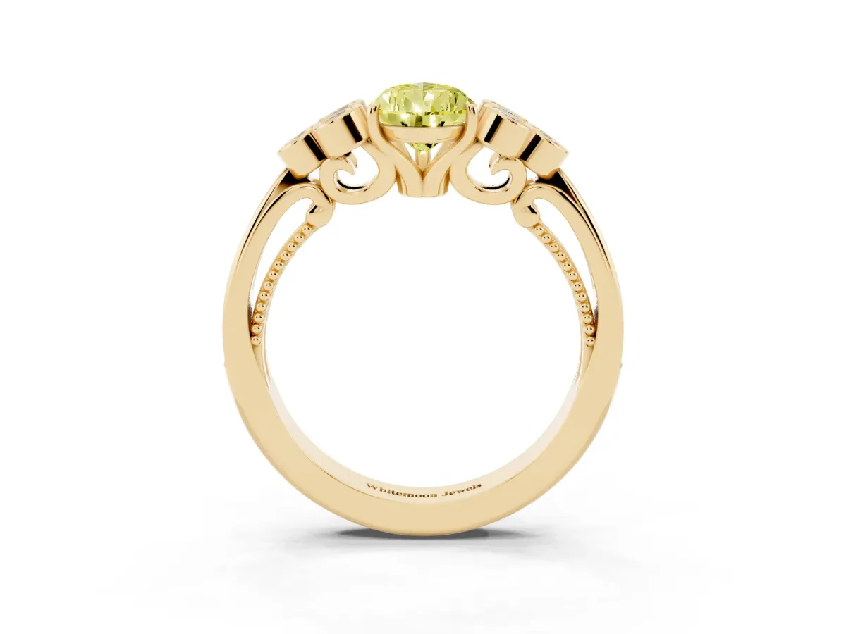 Fancy Yellow Pear Cut Cut Diamond Engagement Ring with Bezel Set Round Side Stones and Prong Setting Yellow gold
