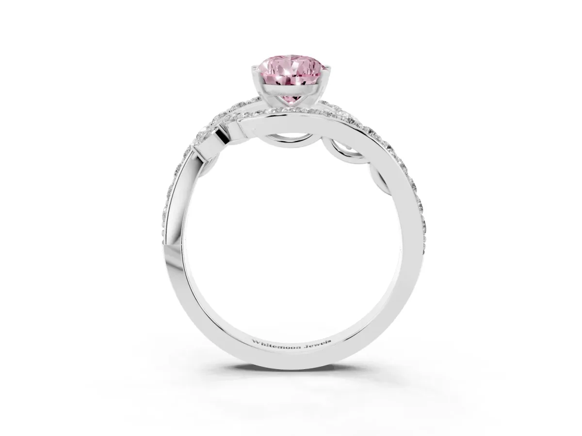 Fancy Pink Pear Cut Solitaire with Pavé Twist Band and Four-Prong Setting Silver