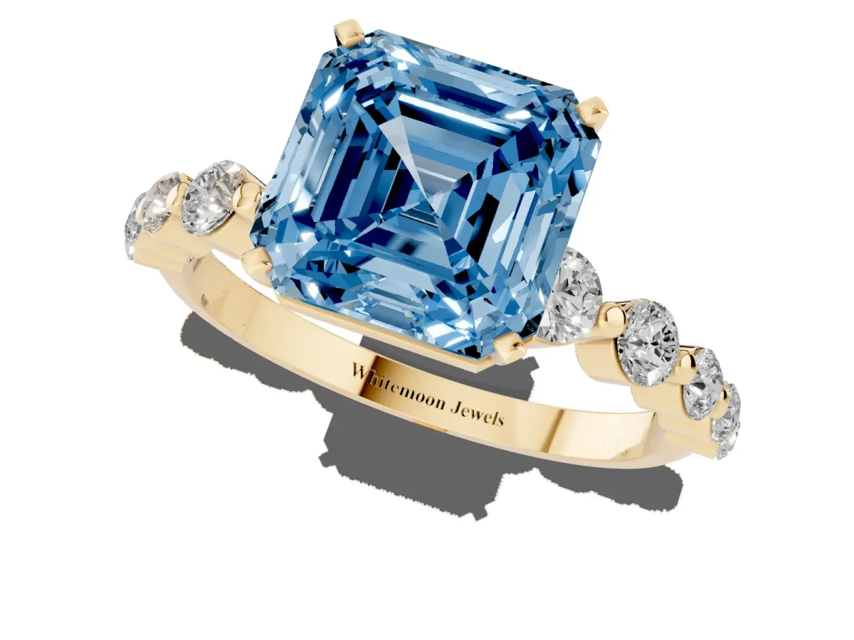 Fancy Blue Asscher Cut Solitaire Diamond Ring with Pave Band and Four-Prong Setting Yellow gold