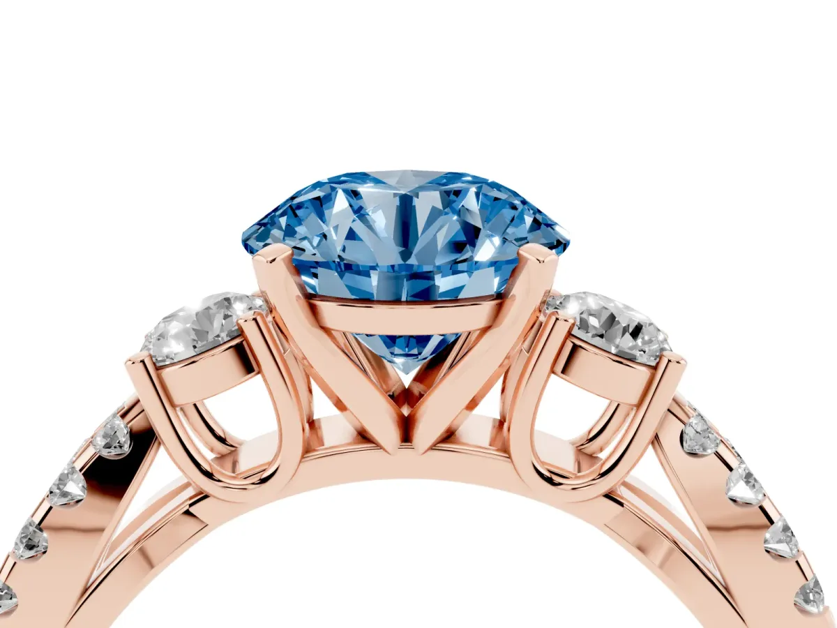 Fancy Blue Round Cut Diamond Three-Stone Ring with Pavé Split Shank and Four-Prong Setting Rose gold