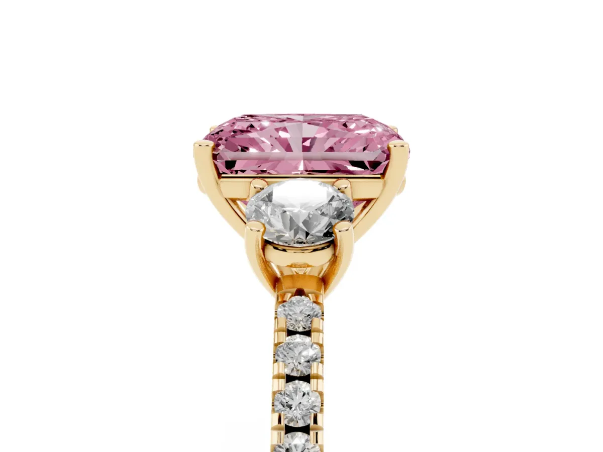 Fancy Pink Three-Stone Radiant Cut Cut Diamond Pavé Band with Prong Setting Yellow gold