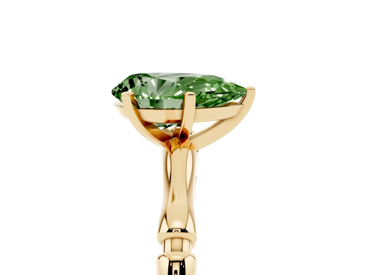 Fancy Green Pear Cut Solitaire Diamond Ring with Bamboo Band and Four-Prong Setting Yellow gold