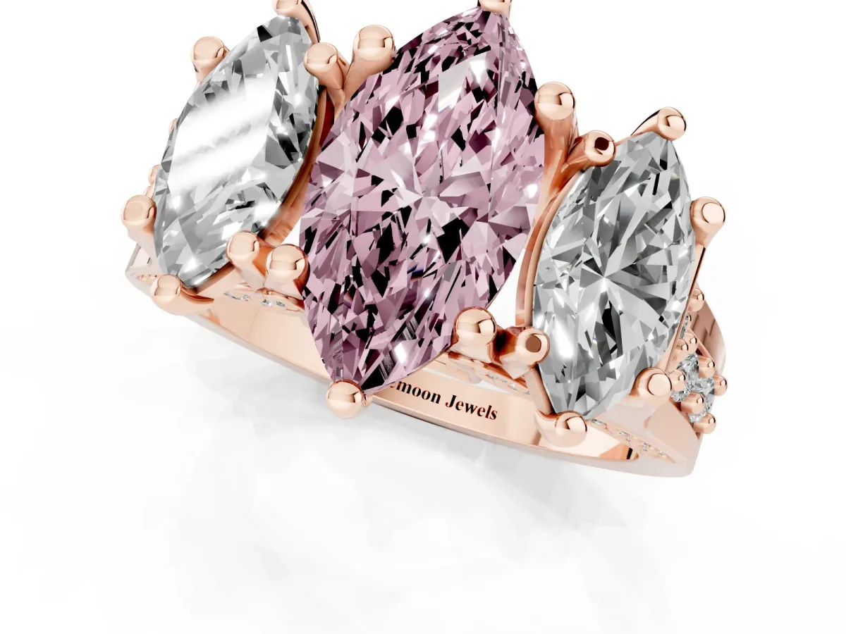 Fancy Pink Marquise Cut Diamond Three-Stone Ring with Channel Set Band and Four-Prong Setting Rose gold