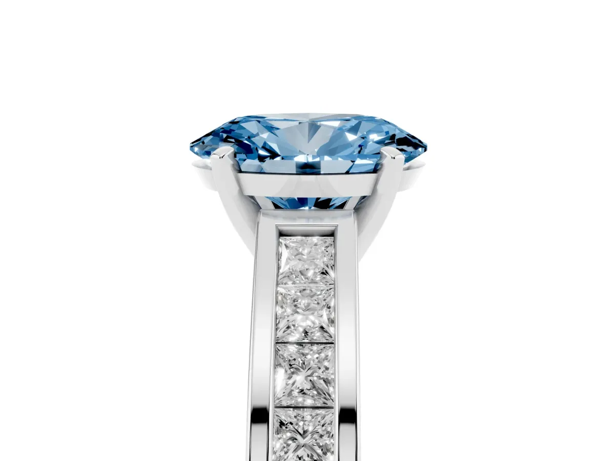 Fancy Blue Oval Cut Solitaire Diamond Ring with Channel-Set Band and Four-Prong Setting Silver