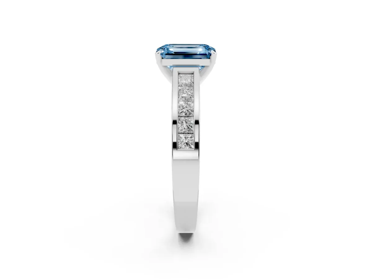 Fancy Blue Emerald Cut Solitaire Diamond Ring with Channel-Set Band and Four-Prong Setting Silver