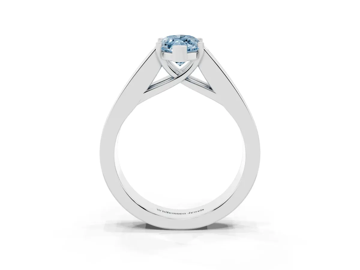 Fancy Blue Marquise Cut Cut Channel Set Solitaire Ring with Four-Prong Setting Silver