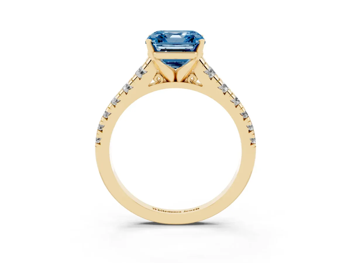 Fancy Blue Asscher Cut Diamond Cathedral Solitaire Ring with Round Pavé Band Yellow gold