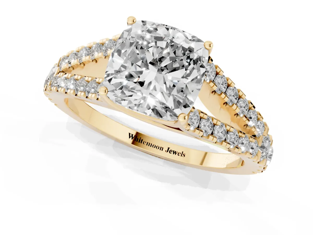 Cushion Cut Diamond Split Shank Engagement Ring with Round Pavé and Prong Setting Yellow gold