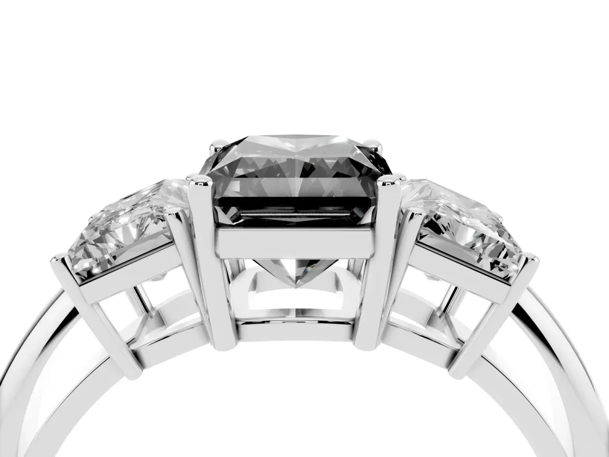 Fancy Black Three-Stone Radiant Cut Cut Diamond Engagement Ring with Prong Setting on a White Gold Band Silver