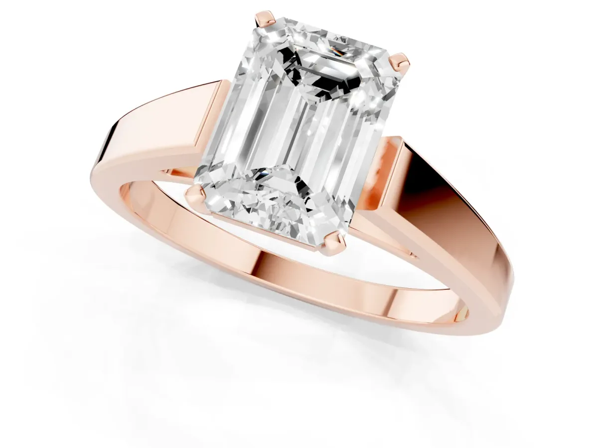 Emerald Cut Solitaire Engagement Ring with Four-Prong Setting and Tapered Band Rose gold