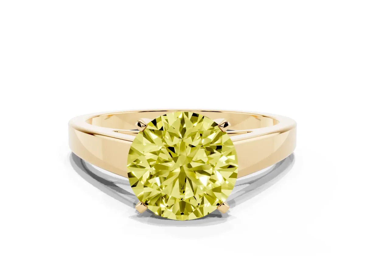 Fancy Yellow Round Cut Solitaire Engagement Ring with Four-Prong Setting and Tapered Band Yellow gold