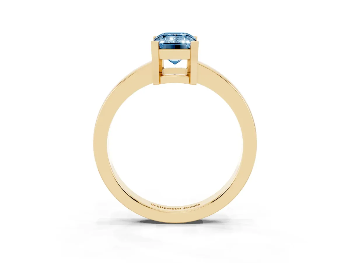 Fancy Blue Emerald Cut Cut Solitaire Ring with Four-Prong Setting and Classic Band Yellow gold
