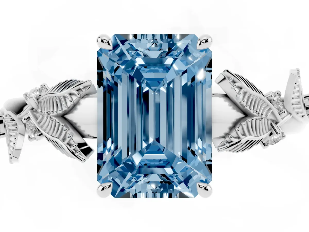 Fancy Blue Emerald Cut Diamond Solitaire Ring with Leaf Motif Band and Four-Prong Setting Silver