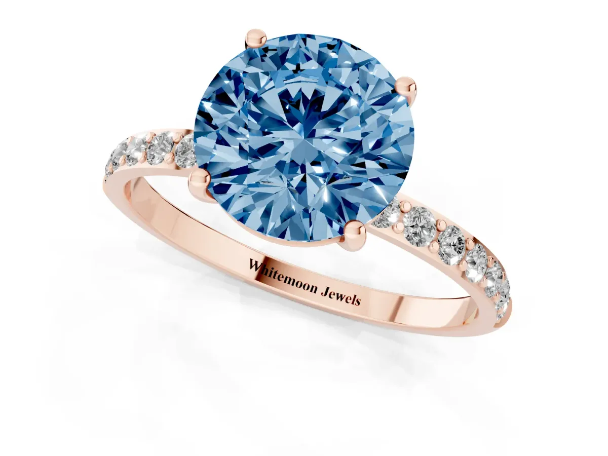 Fancy Blue Round Cut Diamond Solitaire Ring with Round Pavé Shoulders and Prong Setting Rose gold