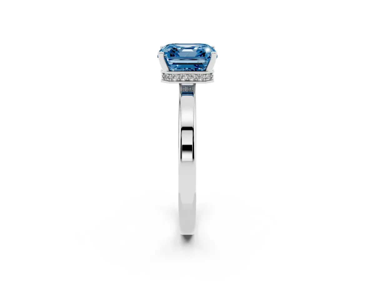 Fancy Blue Asscher Cut Cut Solitaire Engagement Ring with Four-Prong Setting on a Classic Band Silver