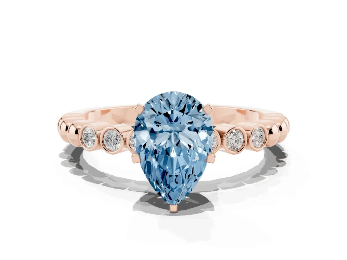 Fancy Blue Pear Cut Solitaire Bezel Accent Diamond Engagement Ring with Beaded Band and Four-Prong Setting Rose gold