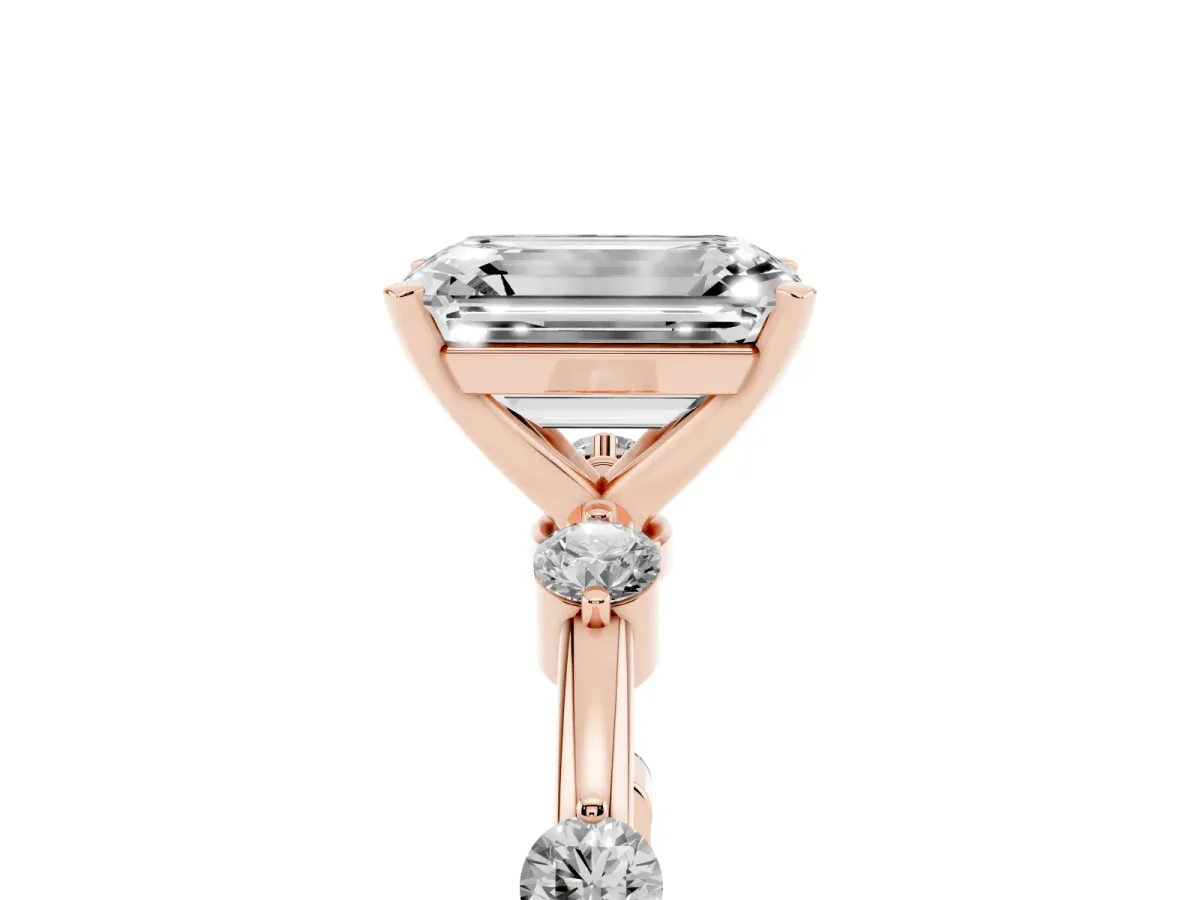Emerald Cut Solitaire Diamond Ring with Bezel Set Side Stones and Prong Setting Rose gold