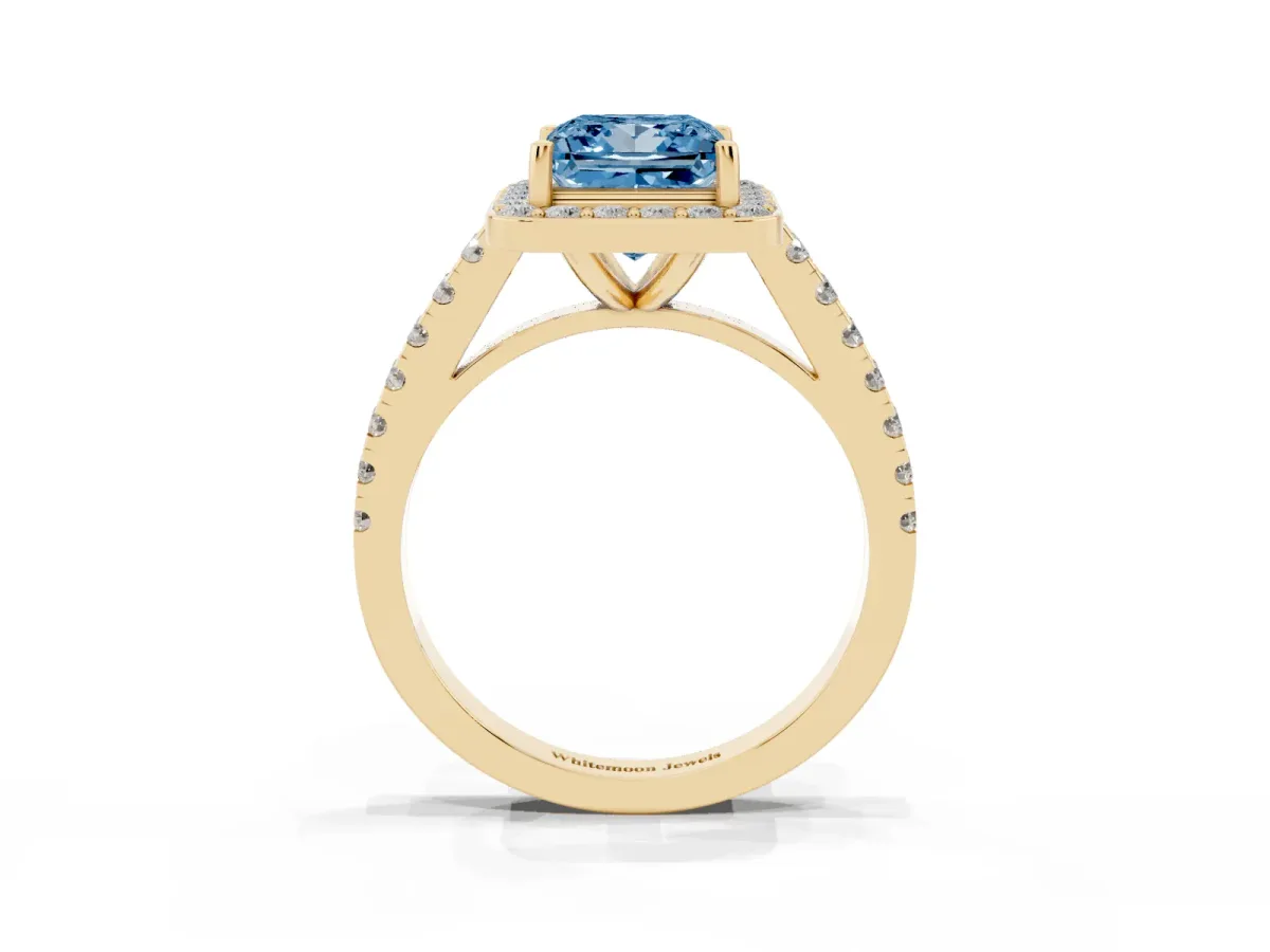 Fancy Blue Princess Cut Diamond Halo Ring with Round Pavé Split Shank and Prong Setting Yellow gold