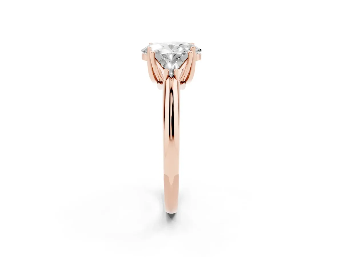Three-Stone Oval Cut Diamond Engagement Ring with Trillion Side Stones and Prong Setting Rose gold