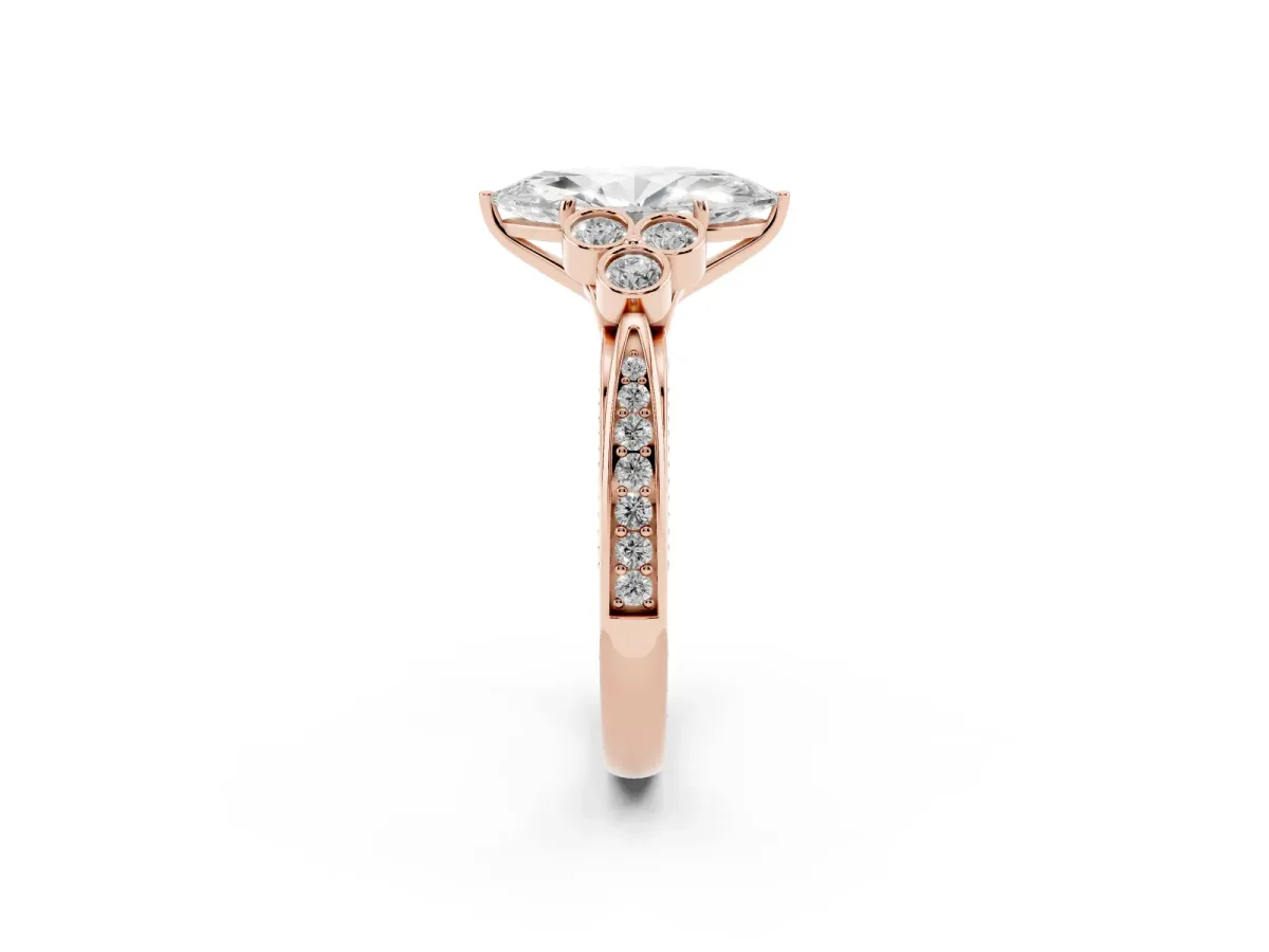 Marquise Cut Cut Diamond Engagement Ring with Bezel Set Round Side Stones and Prong Setting Rose gold