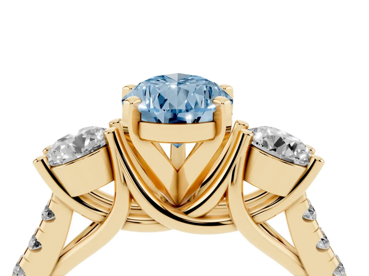 Fancy Blue Three-Stone Pear Cut Diamond Pavé Band with Four-Prong Setting Yellow gold