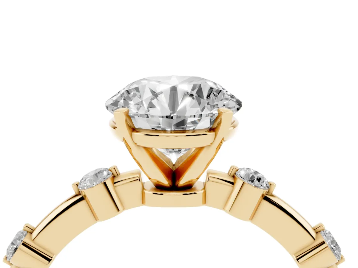 Round Cut Solitaire Diamond Ring with Bezel Set Side Stones and Prong Setting Yellow gold