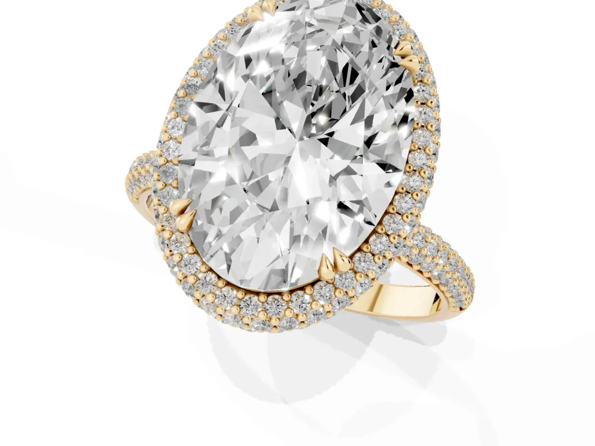 Oval Diamond Halo Ring with Round Diamond Accents Yellow gold