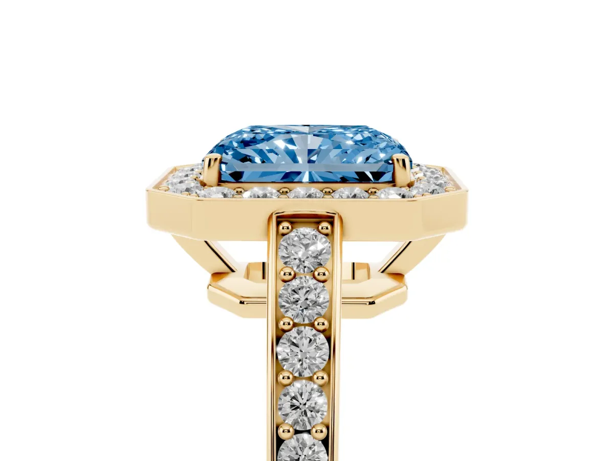 Fancy Blue Radiant Cut Halo Pavé Diamond Engagement Ring with Bezel Setting Yellow gold