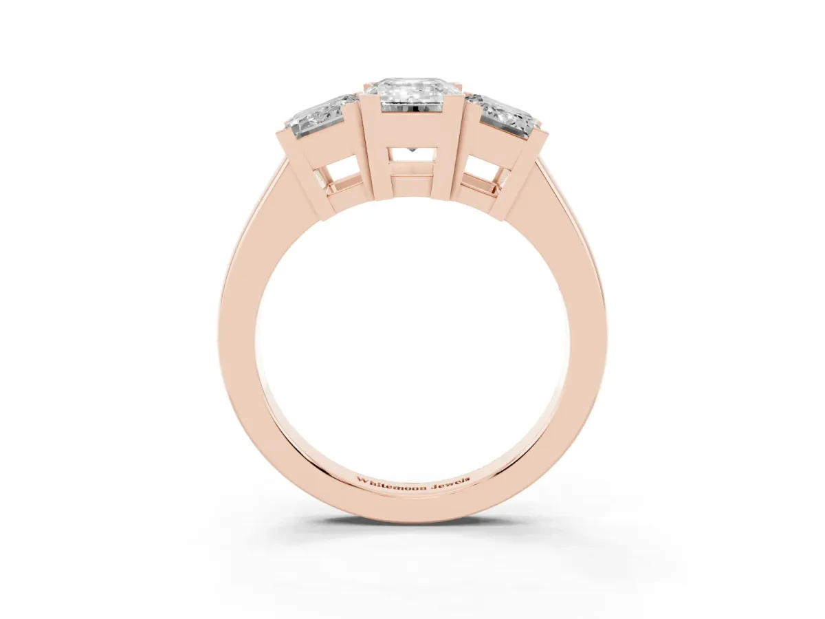 Three-Stone Emerald Cut Cut Diamond Ring with Channel Set Band and Four-Prong Setting Rose gold