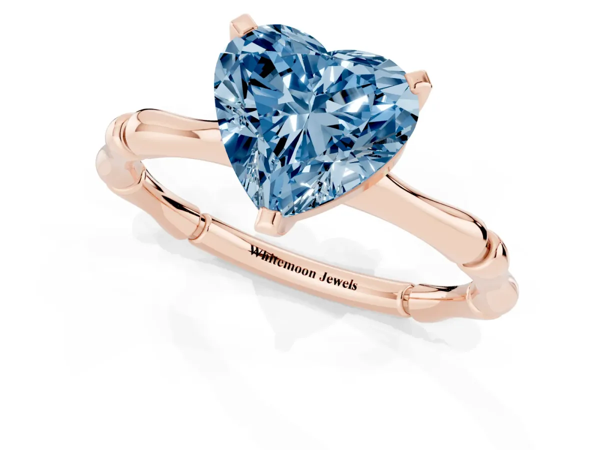Fancy Blue Heart Cut Solitaire Diamond Ring with Bamboo Band and Four-Prong Setting Rose gold